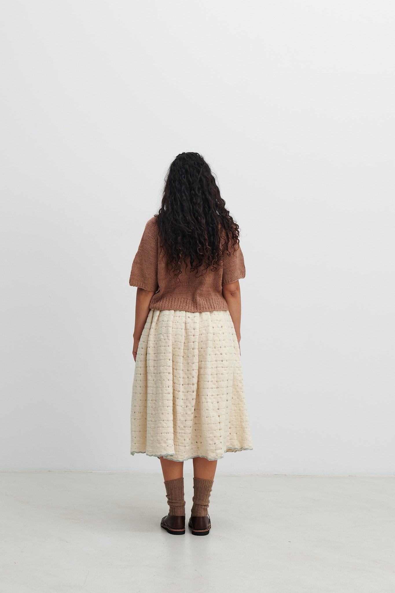Runaway Bicycle - handloomed merino wool skirt with a slightly felted surface. Comes with a cotton underskirt.
