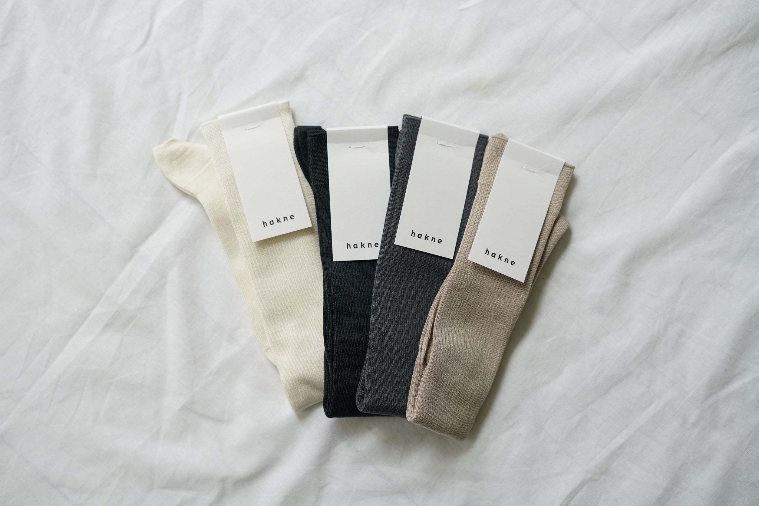 hakne Silk Ribbed High Socks
