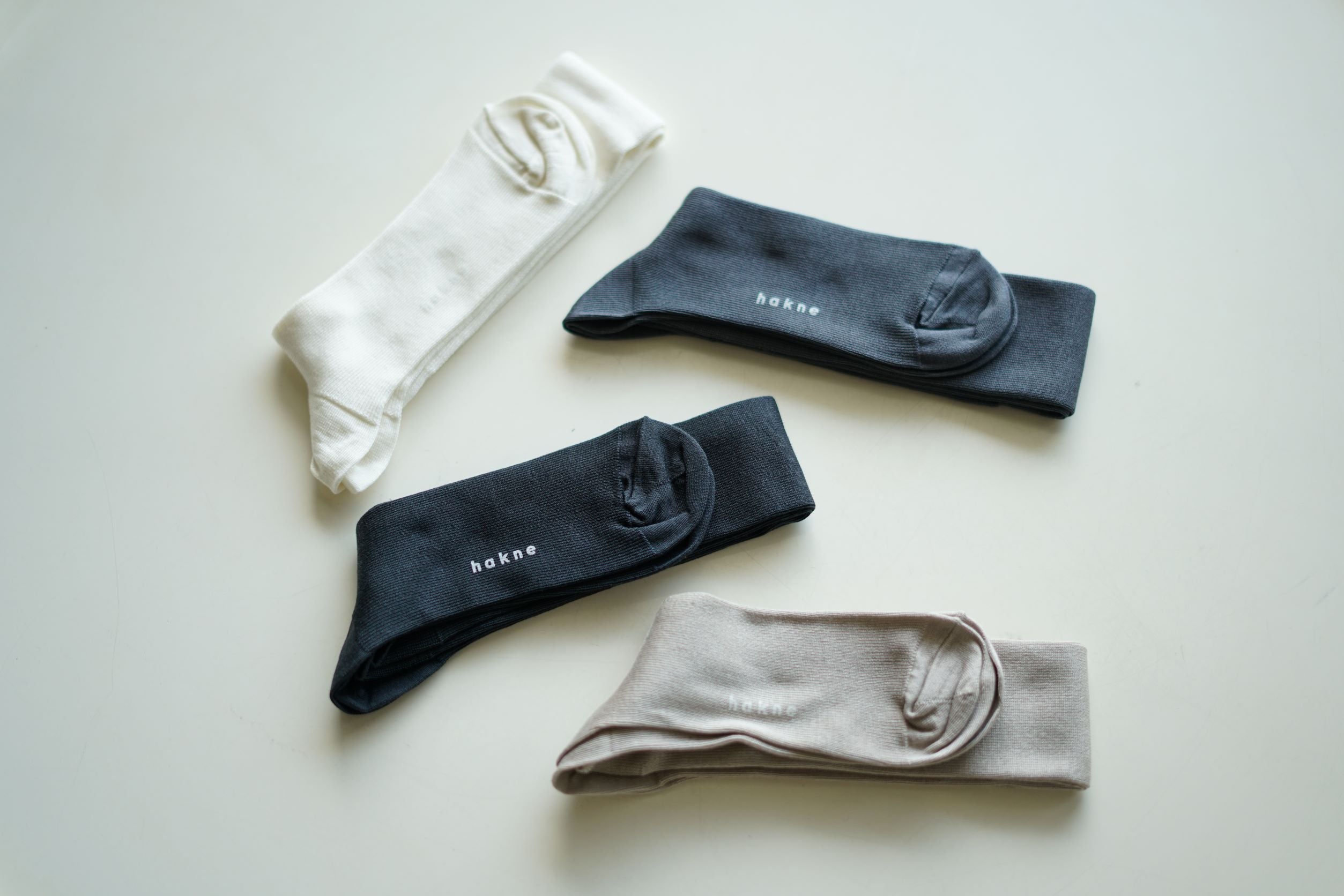 hakne Silk Ribbed High Socks