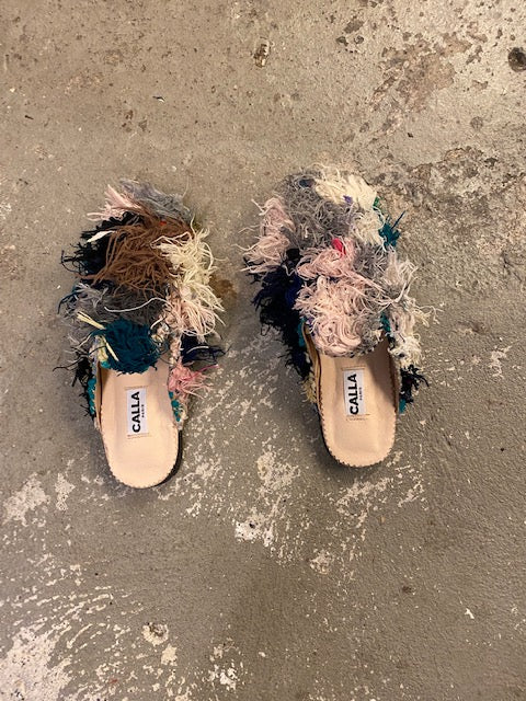 Handmade, one-of-a-kind Babouches. Made from upcycled, vinatge Berber rugs by Moroccan artisans. 
