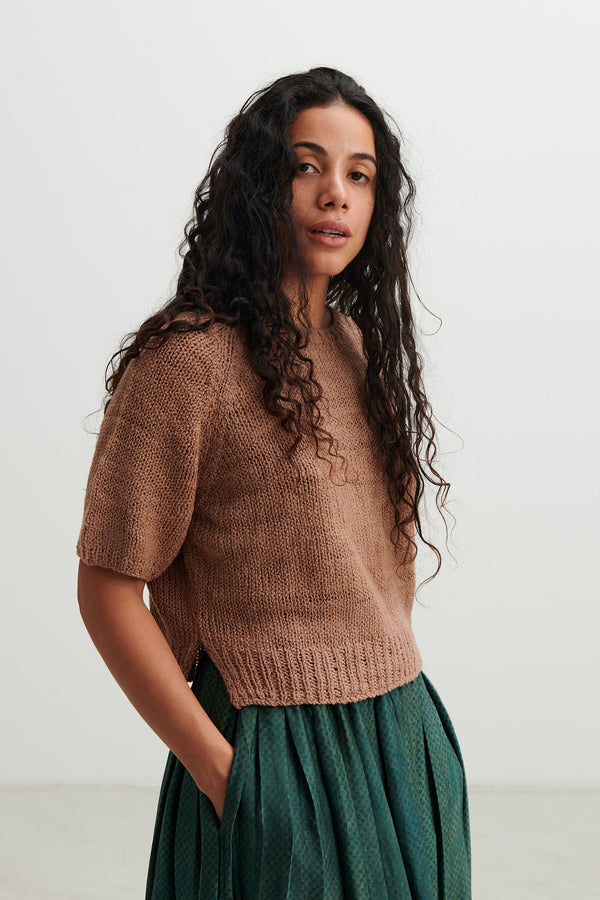 Runaway Bicycle - merino wool - slightly cropped blouse with elbow lenght sleeves. The ribbed bottom of the blouse have little slits. Made in India